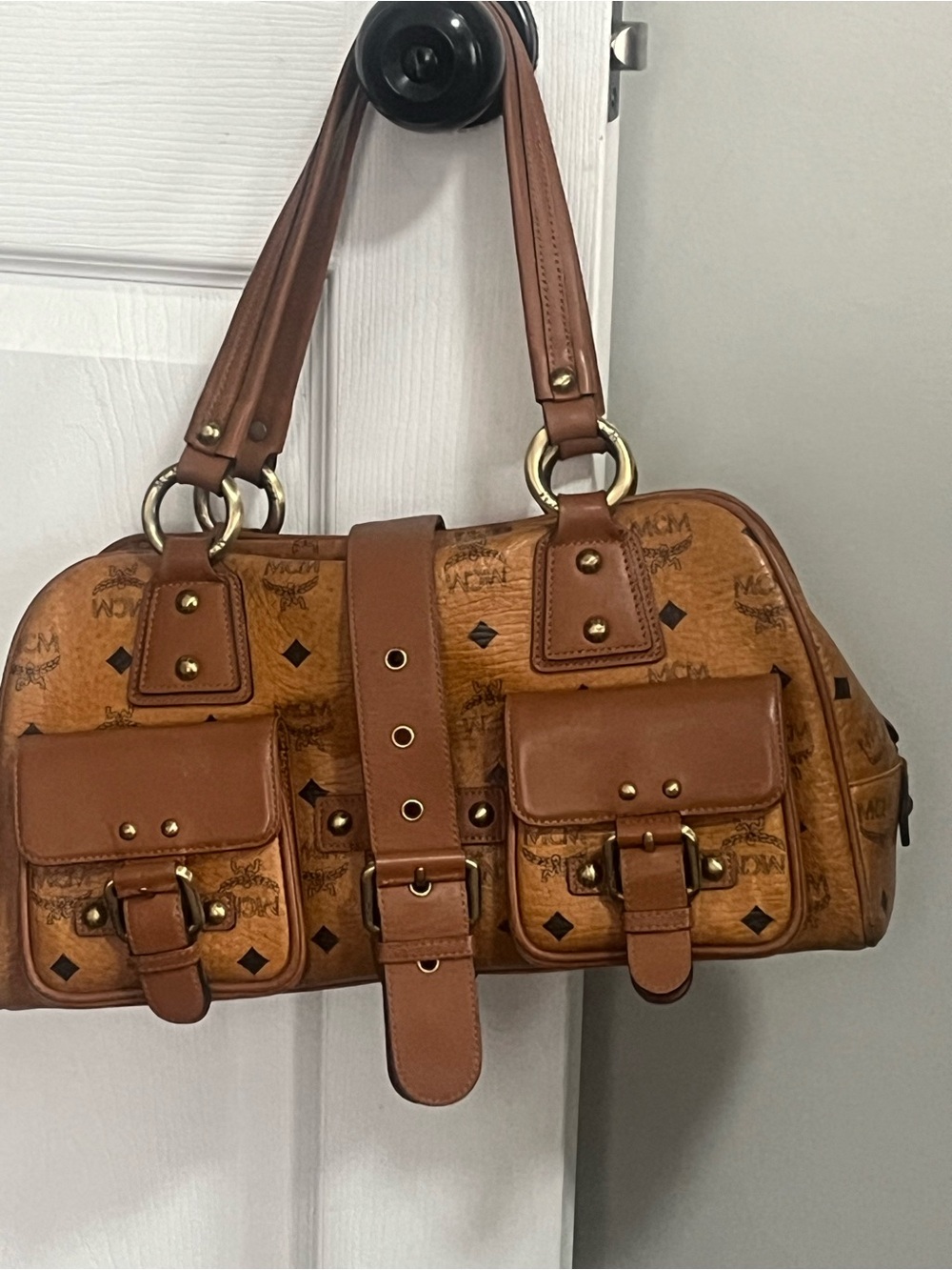 MCM Cognac Logo Pocket Tote with brass/gold Hardware in nice condition